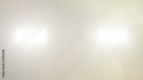 Searchlights. A bright flashing light.