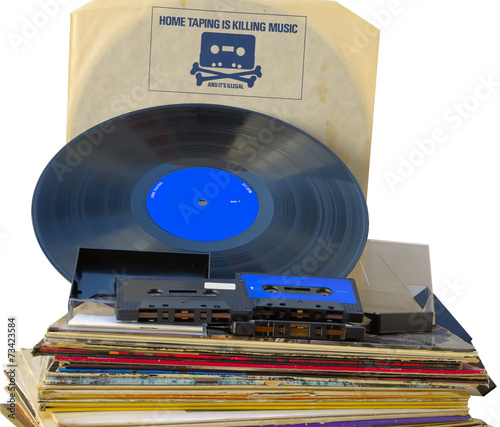 Fotografija Vinyl record inner sleeve with 1980s  cassette tape head.