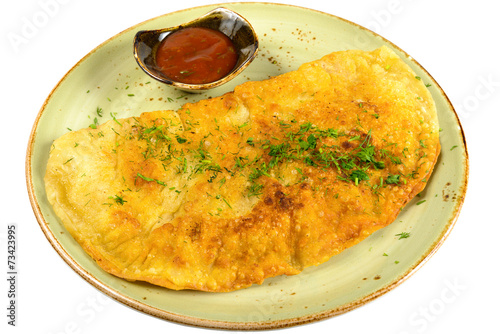 Empanada on a plate photo