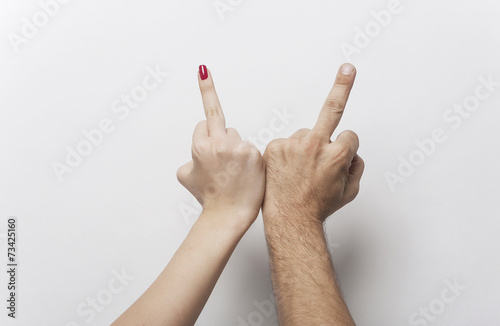 Couple making middle finger irreverent gesture