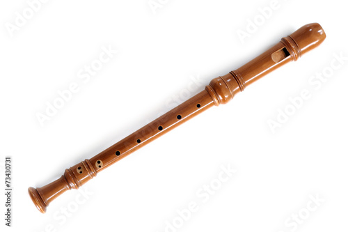 single recorder, musical instrument of wood, isolated on white photo