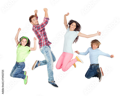 Young happy family jumping
