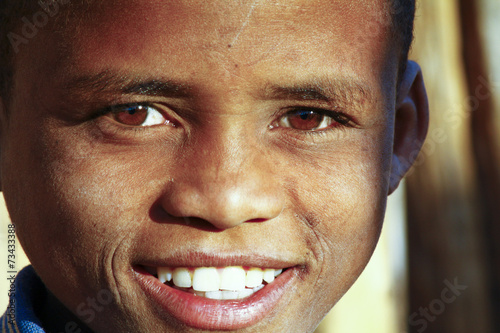 Cute african boy with beautiful smile - Madagascar photo