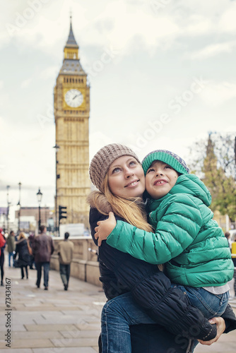 Happy family in front of a popular London sight Big Ben