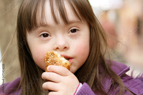 Portrait of beautiful girl that eating baguette