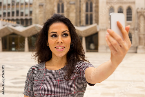 young woman taking a selfie