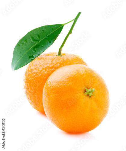 Ripe tangerine with leaf.