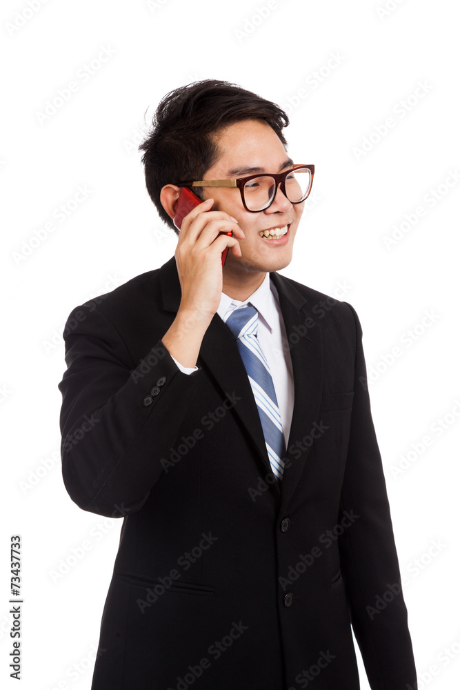 Asian businessman smile talk on mobile phone Asian businessman smile talk on mobile phone