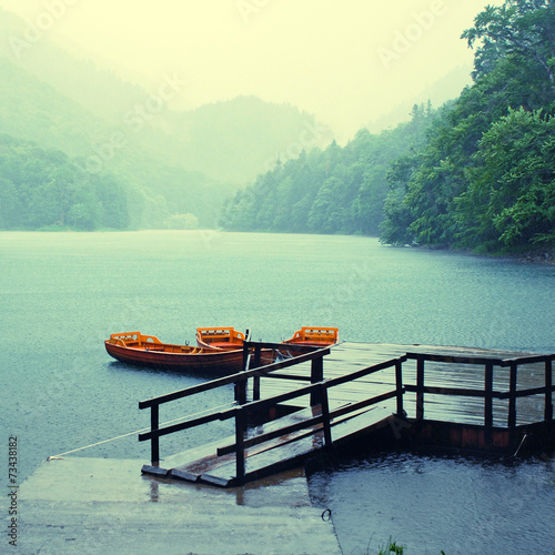 Rain on the lake, square toned image photo