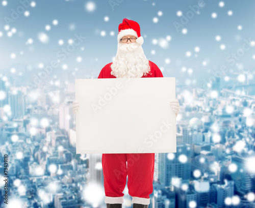 man in costume of santa claus with billboard © Syda Productions