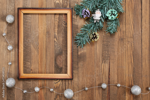 Vintage photo frame on wooden background