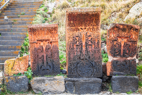 Khachkars in front of Sevanavank Monastery Complex photo