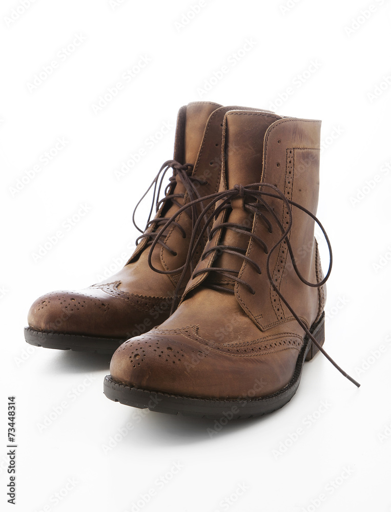 Brown boot on white background