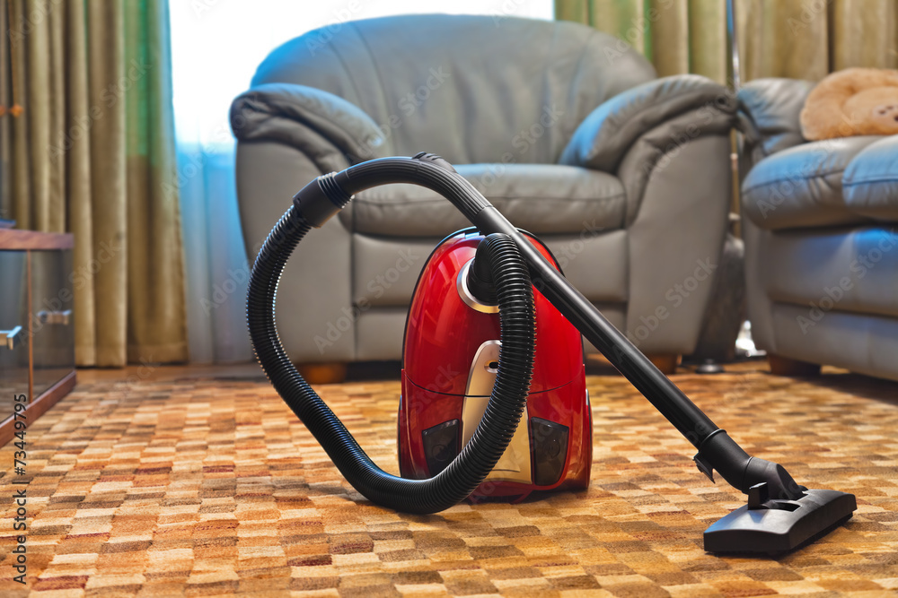 Vacuum cleaner in room