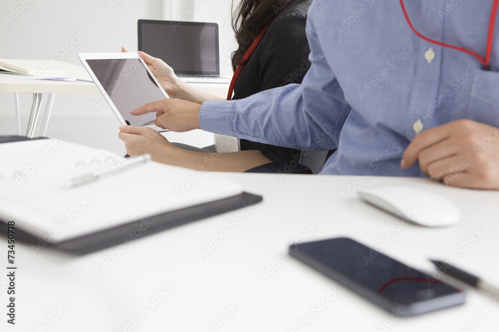 Fototapeta premium And turned around, businessman touching the tablet