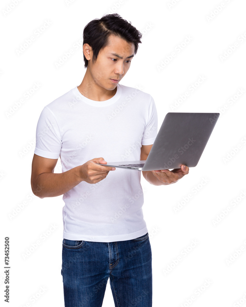 Asian man use of laptop Asian man use of laptop