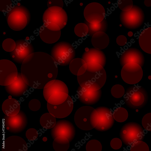 Abstract neon red circles on a black background