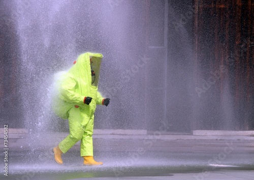 yellow suit to protect against chemical agents and viruses photo