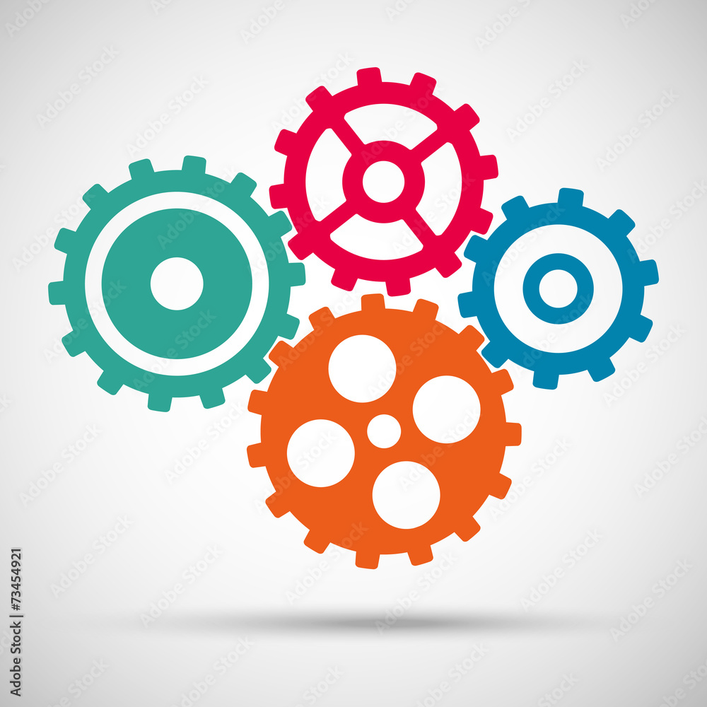 Different toothed gears (cogs) is meshed on gray background Different toothed gears (cogs) is meshed on gray background