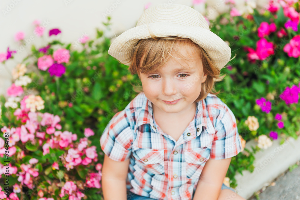 Summer portrait of a cute toddler boy
