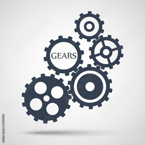 Gray toothed gears (cogs) is meshed on gray background