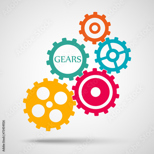 Colored toothed gears (cogs) is meshed on gray background