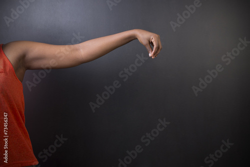 South African or African American woman teacher hand