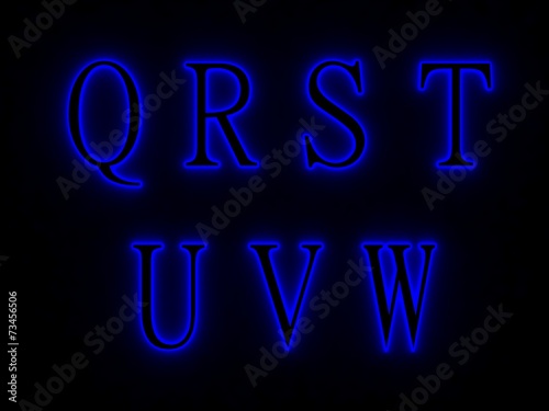 Blue neon signs with letters of the alphabet.