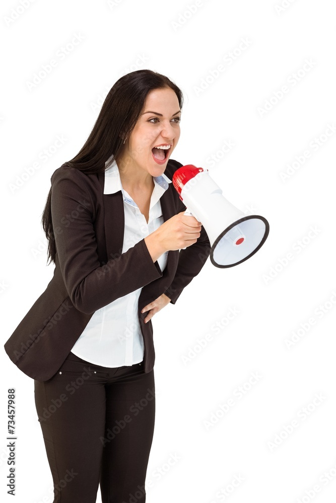 Pretty businesswoman shouting with megaphone Pretty businesswoman shouting with megaphone