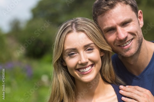 Cute couple smiling at camera © WavebreakmediaMicro