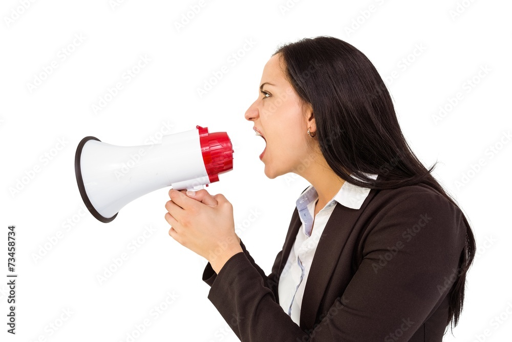 Pretty businesswoman shouting with megaphone Pretty businesswoman shouting with megaphone
