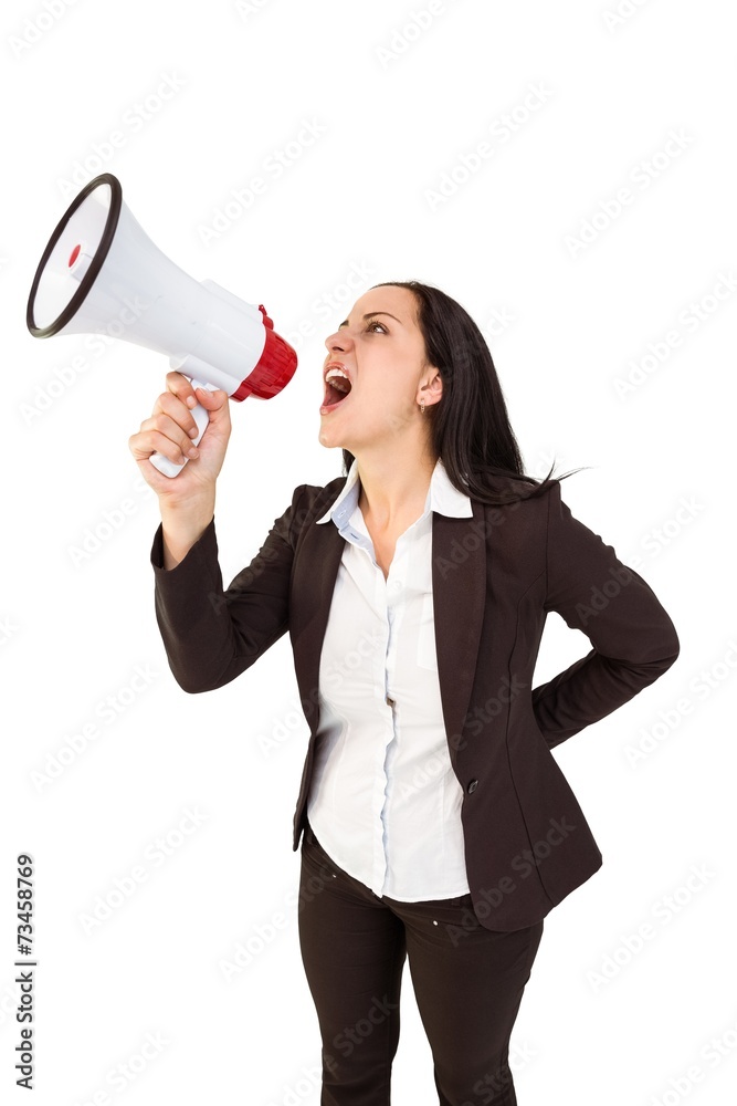 Pretty businesswoman shouting with megaphone Pretty businesswoman shouting with megaphone
