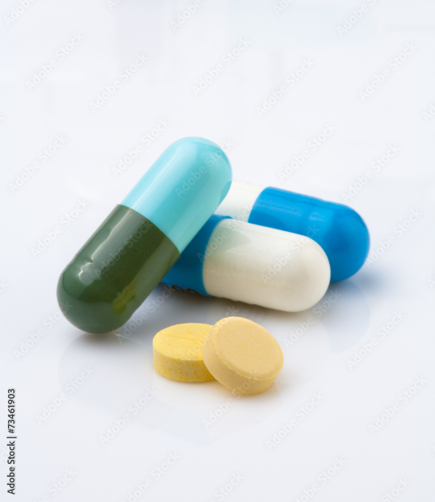 tablets and capsule on white background tablets and capsule on white background