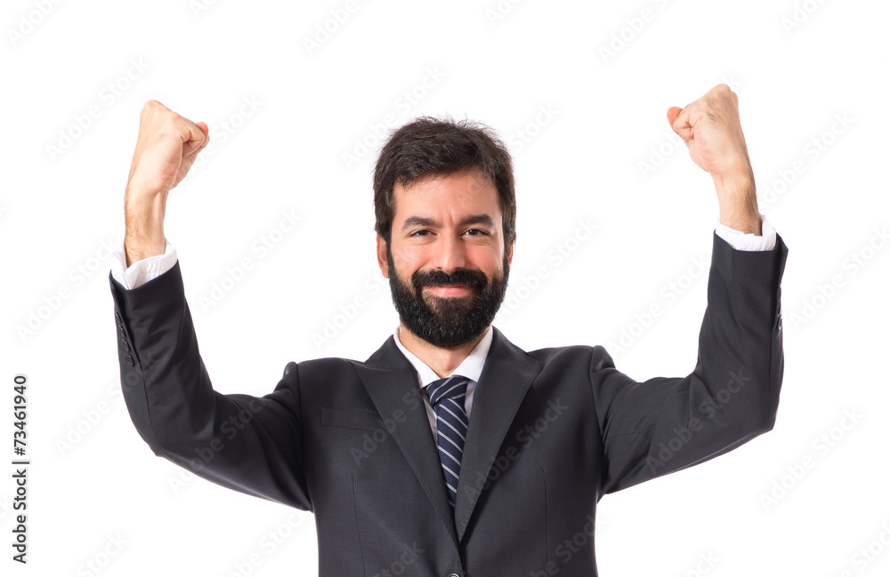 Lucky businessman over isolated white background Lucky businessman over isolated white background