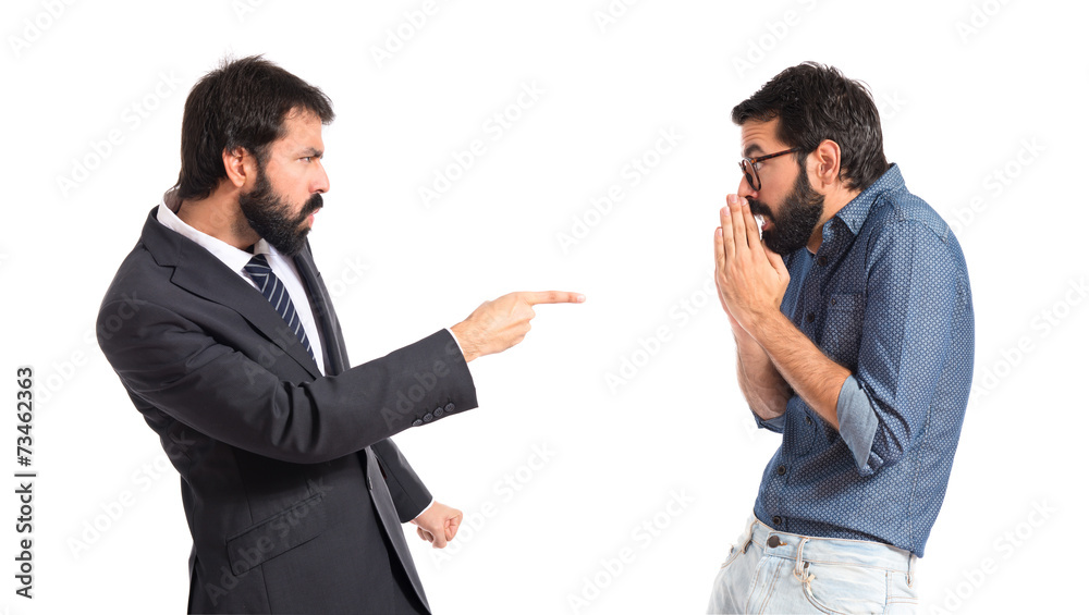 Person angry with his brother over white background Person angry with his brother over white background
