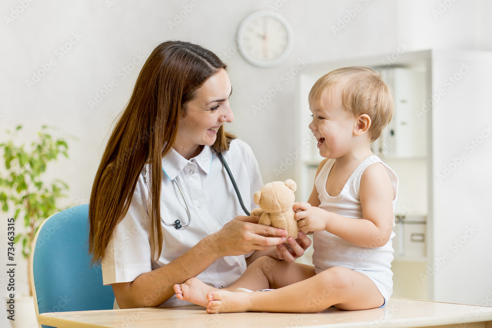 pediatrician examining of child with stethoscope pediatrician examining of child with stethoscope