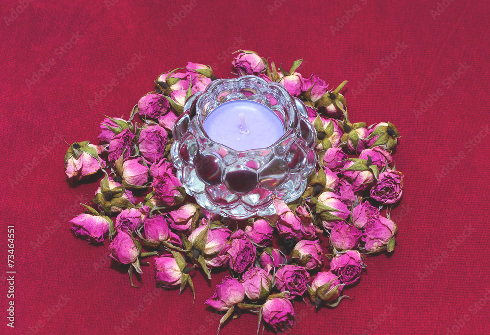 Beautiful composition with candle and roses