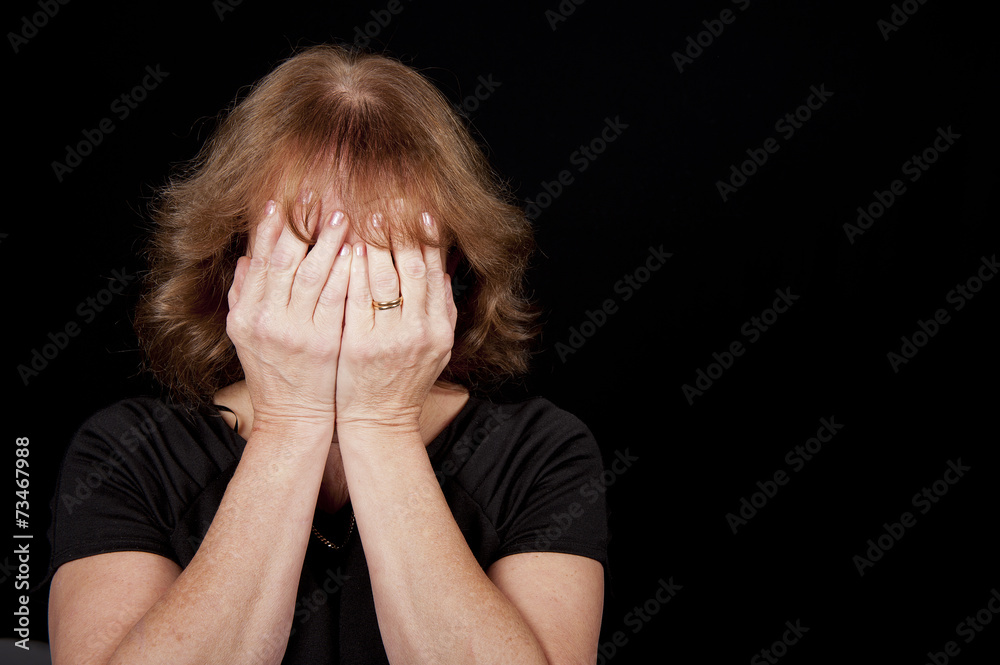 Woman Crying Into Hands Woman Crying Into Hands