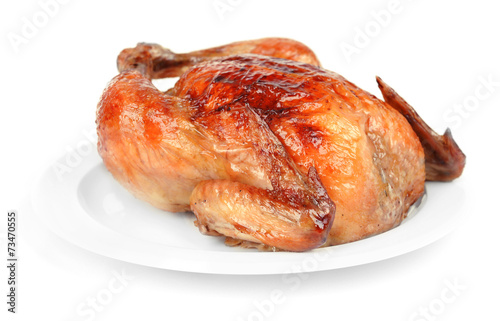 Delicious baked chicken on plate isolated on white