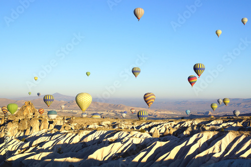 Hot air balloon flying over Cappadocia.