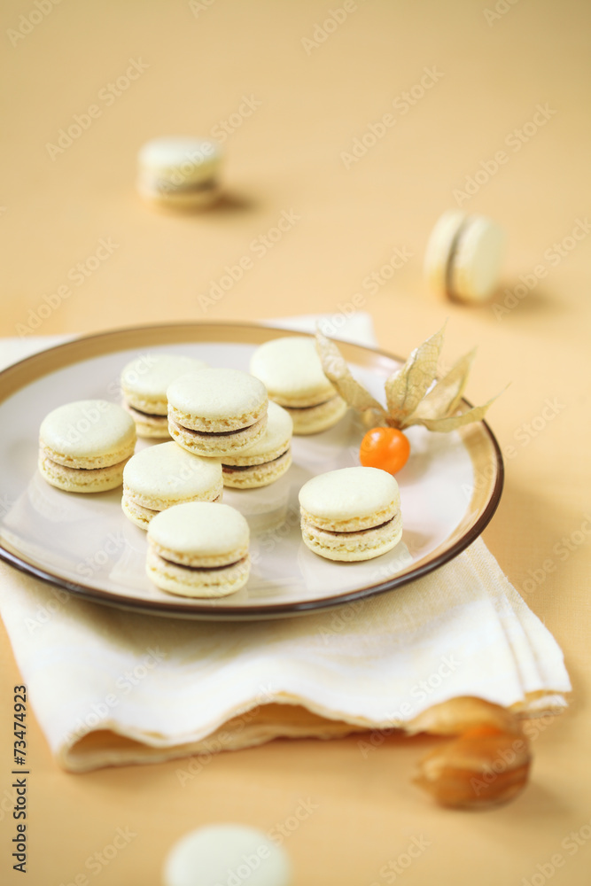 Light Yellow Macarons with Chocolate and Passionfruit Ganache Light Yellow Macarons with Chocolate and Passionfruit Ganache