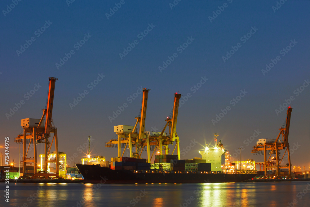 beautiful lighting of freight container comercial ship with ship