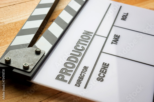 фотографія Movie slate film on wooden table