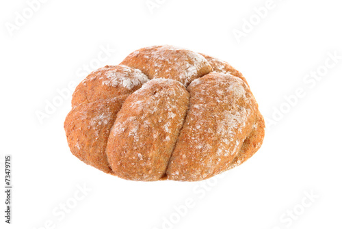 Close-up of a wholemeal plaited bread on white background