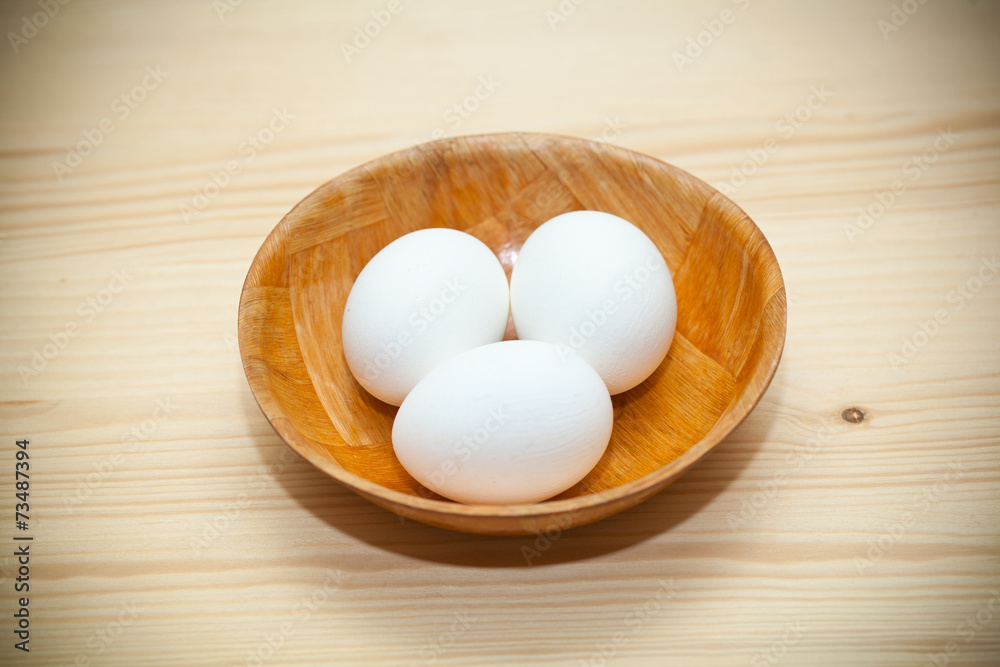 white chicken eggs in a plate