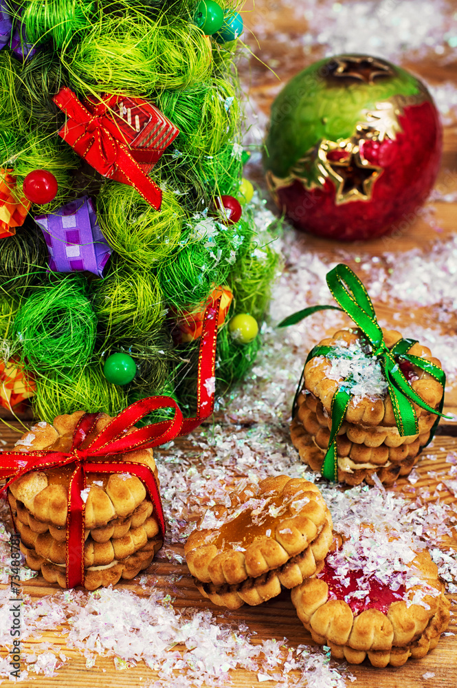 Christmas cookies on the background of decorated Christmas trees