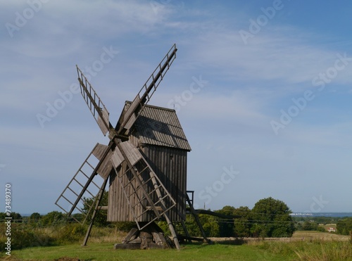 A historic wooden wind mill at the countryside of Oeland