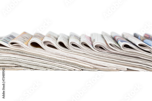 Assortment of folded newspapers