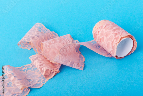 Foto closeup of vintage pink lace patterned with flowers
