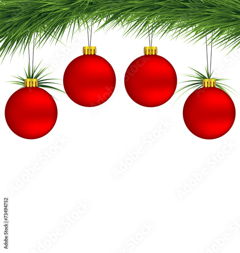 Red Christmas balls on pine branch isolated on white